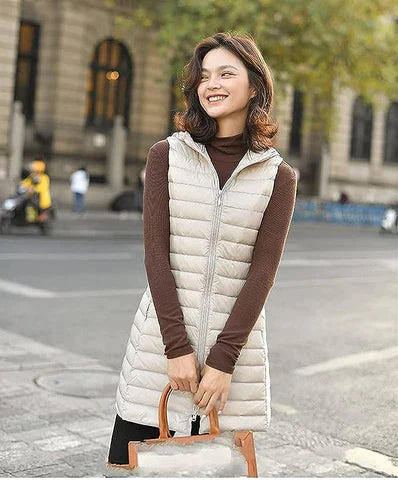 Maya™ - Den komfortable og moderigtige quiltede bodywarmer med lang hætte